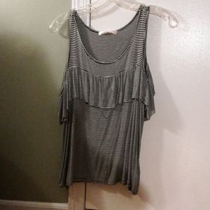 Black and white ruffled blouse